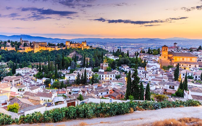 Alhambra and Granada cityscape at sunset, view from Albaicín.