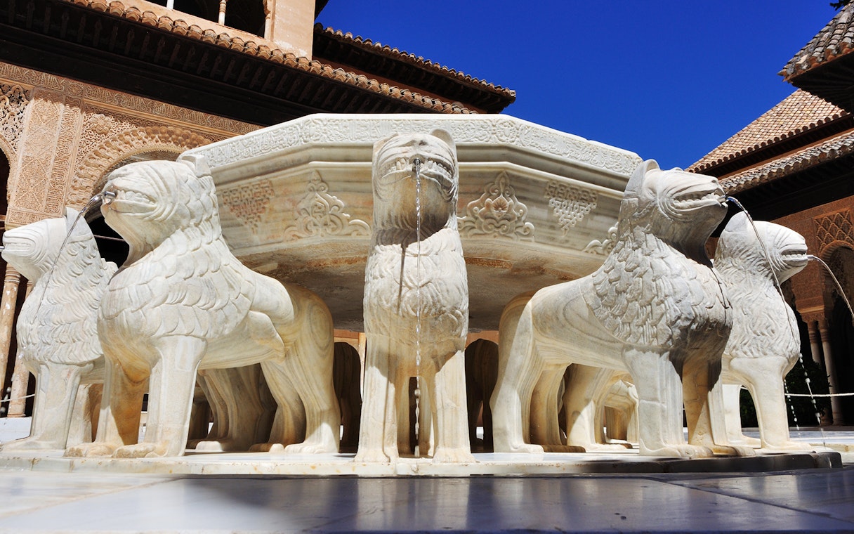 Lion Fountain at the Alhambra in Granada, part of a guided tour including the Cathedral and Royal Chapel.