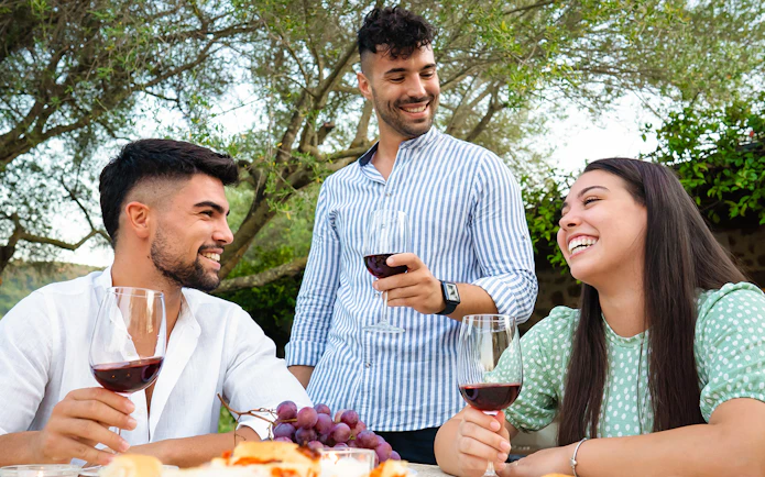 Small group enjoying wine tasting on Tuscany Wine and Olive Oil Trail from Florence.