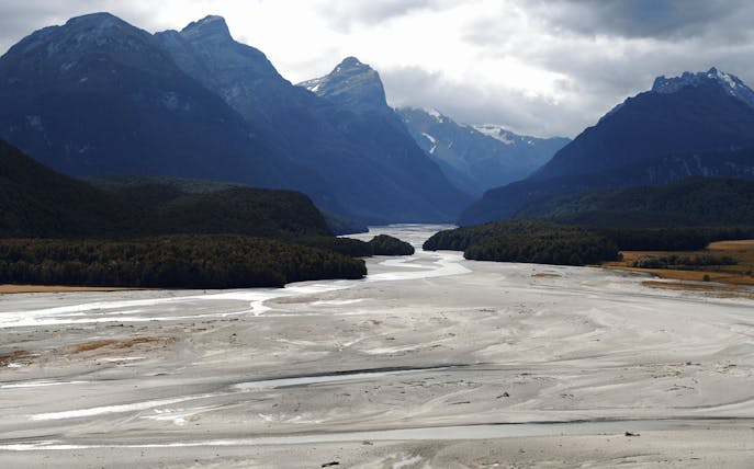 Mountainous landscape from Lord of the Rings tour near Queenstown, featuring a winding river.