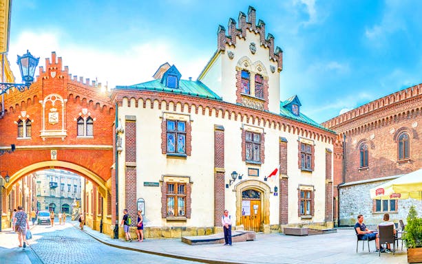 Czartoryski Museum entrance with visitors in Krakow, Poland.