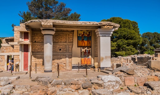 Knossos Palace ruins with ancient frescoes in Heraklion, showcasing Minoan civilization.