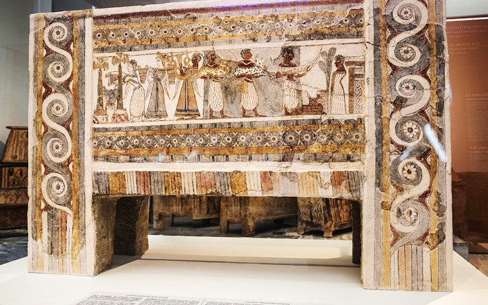 Minoan fresco with ceremonial scene at Heraklion Archaeological Museum.