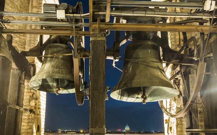 Bells in a tower overlooking Torino at night, part of the Italian Guided Tour through the Torino Noir.