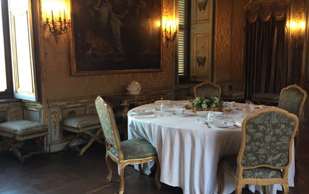 Dining room with ornate decor at the Royal Palace of Turin.