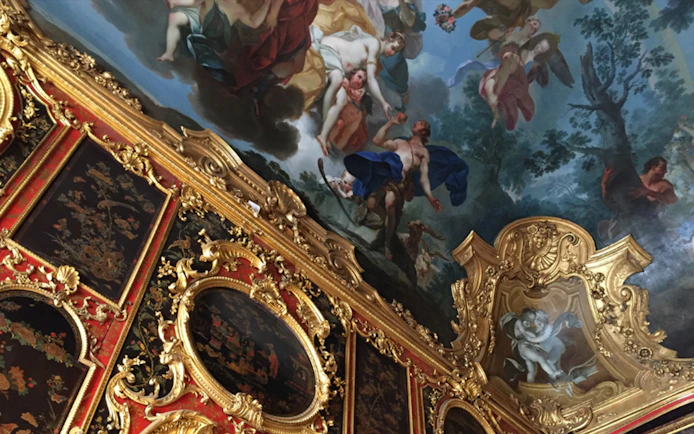 Ceiling fresco and ornate gold detailing in the Royal Palace of Turin.