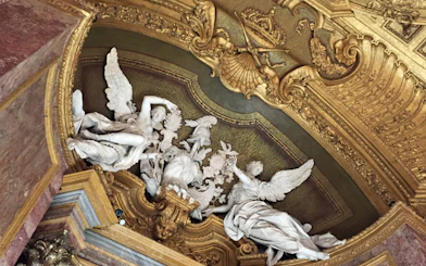 Sculptures and ornate ceiling detail at the Royal Palace of Turin.