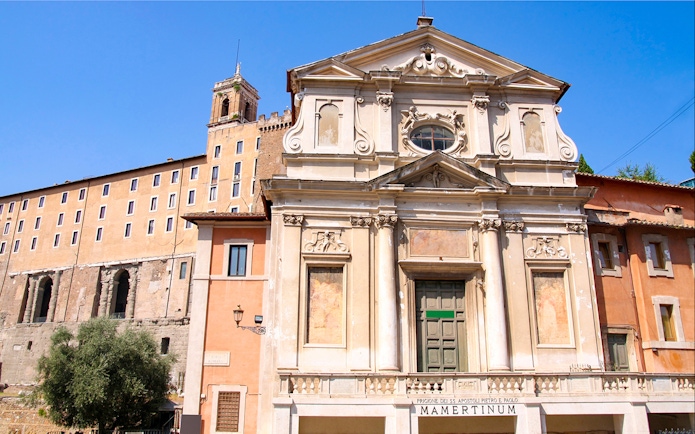 Mamertine Prison entrance in Rome with historical architecture.