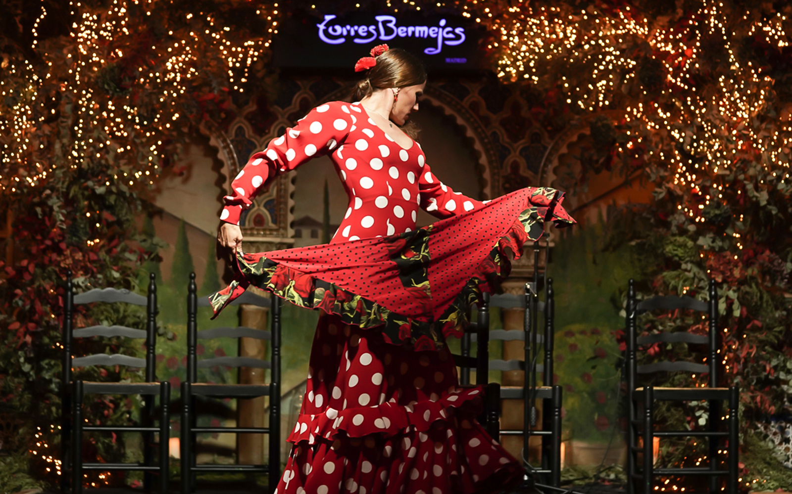 Flamenco dancer performing at Torres Bermejas during Royal Madrid Palace Tour.