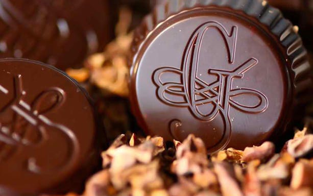 Chocolate praline with intricate design, part of Tasty Turin tour.