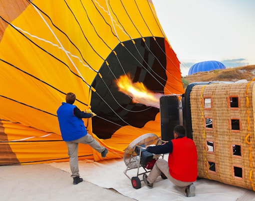 Inflating the Balloon - This is a Photograph of Inflating the Balloon