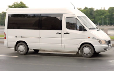 White shuttle van for Cappadocia airport transfer service.