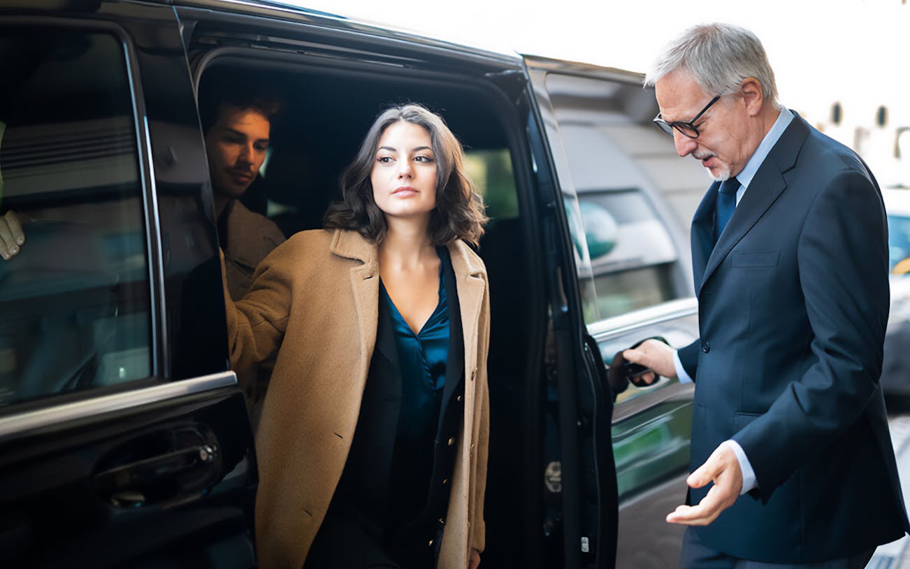 Passengers exiting a private car during Cappadocia airport transfer.