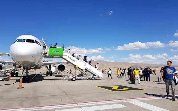 Passengers disembarking a plane in Cappadocia during a tour from Istanbul.