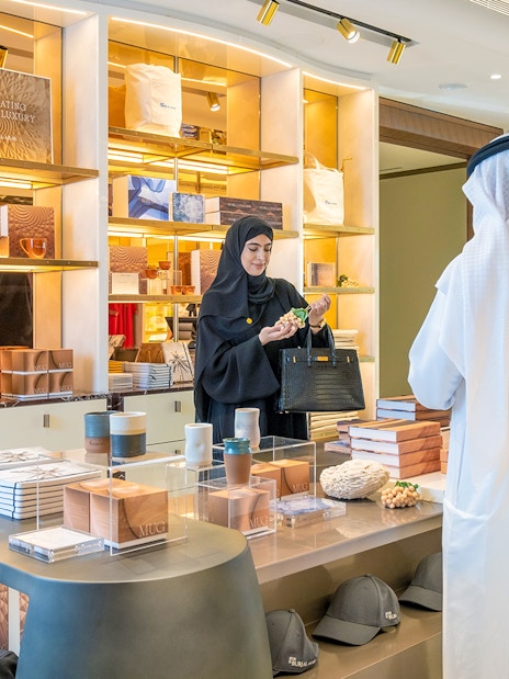 Guests exploring a gift shop during a guided tour inside Burj Al Arab, Dubai.