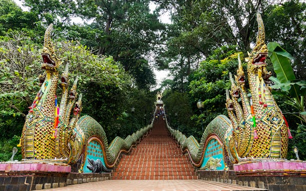 Staircase with ornate dragon sculptures leading to Doi Suthep temple, Chiang Mai.