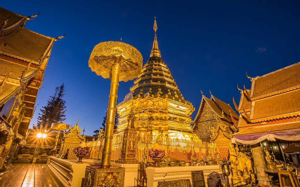 Golden pagoda at Wat Phra That Doi Suthep during sunrise, Chiang Mai, Thailand.