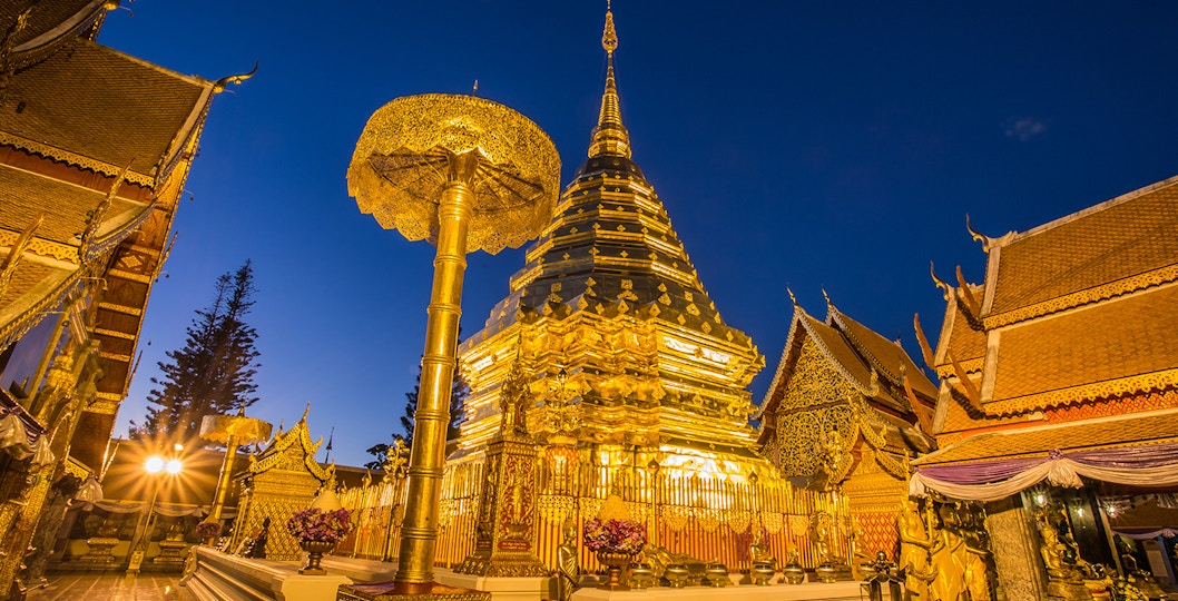 Golden pagoda at Wat Phra That Doi Suthep during sunrise, Chiang Mai, Thailand.