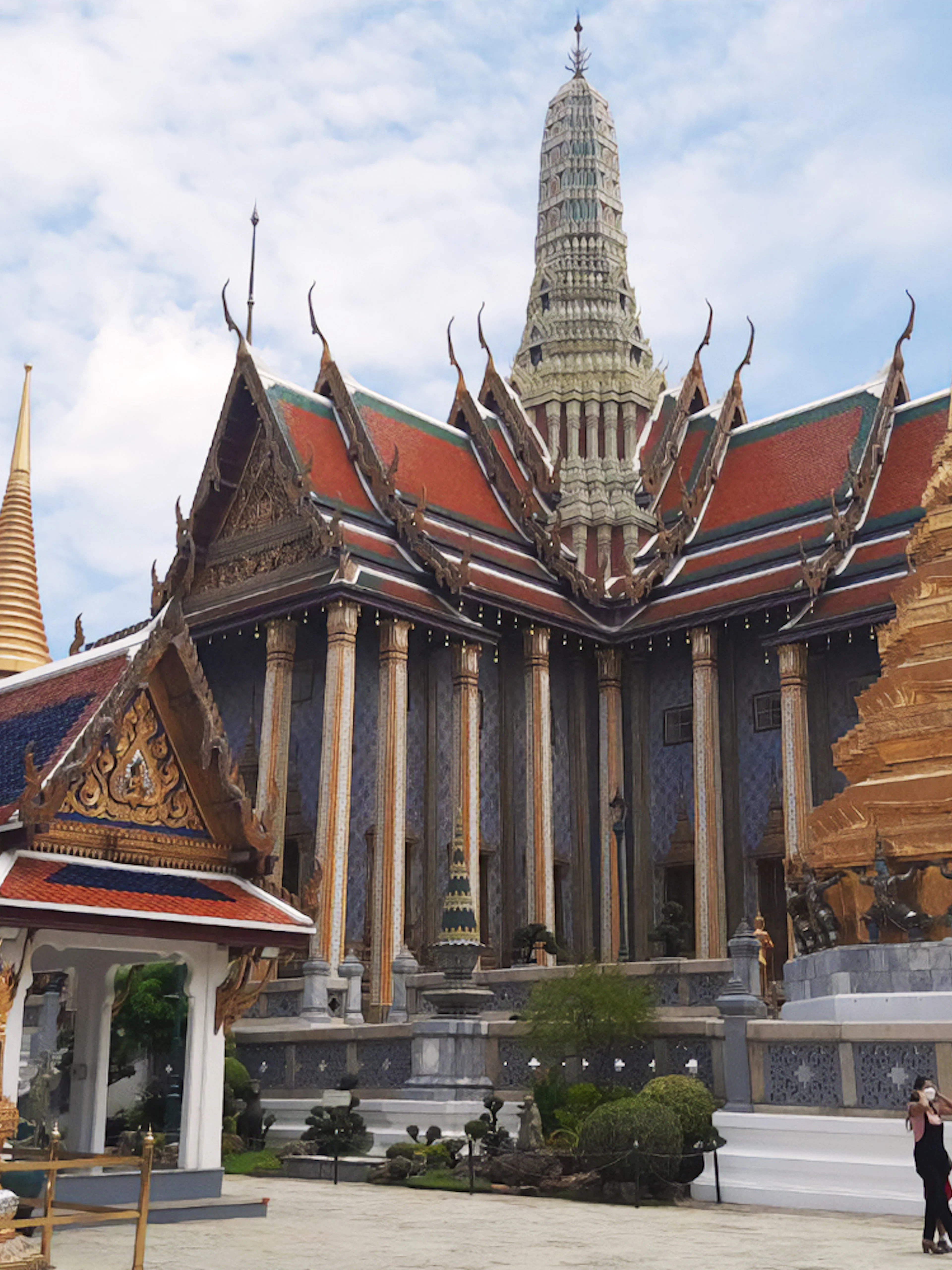 Grand Palace and Wat Phra Kaew with ornate spires in Bangkok, Thailand.