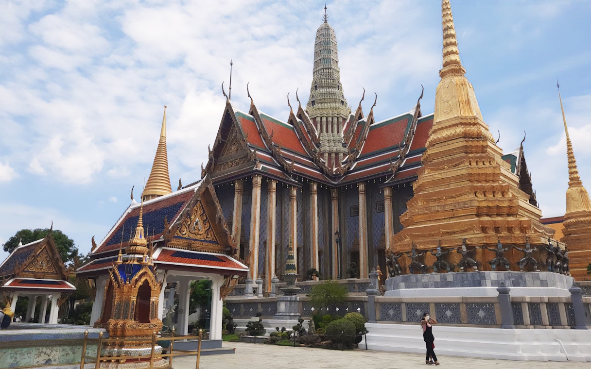 Grand Palace and Wat Phra Kaew with ornate spires in Bangkok, Thailand.