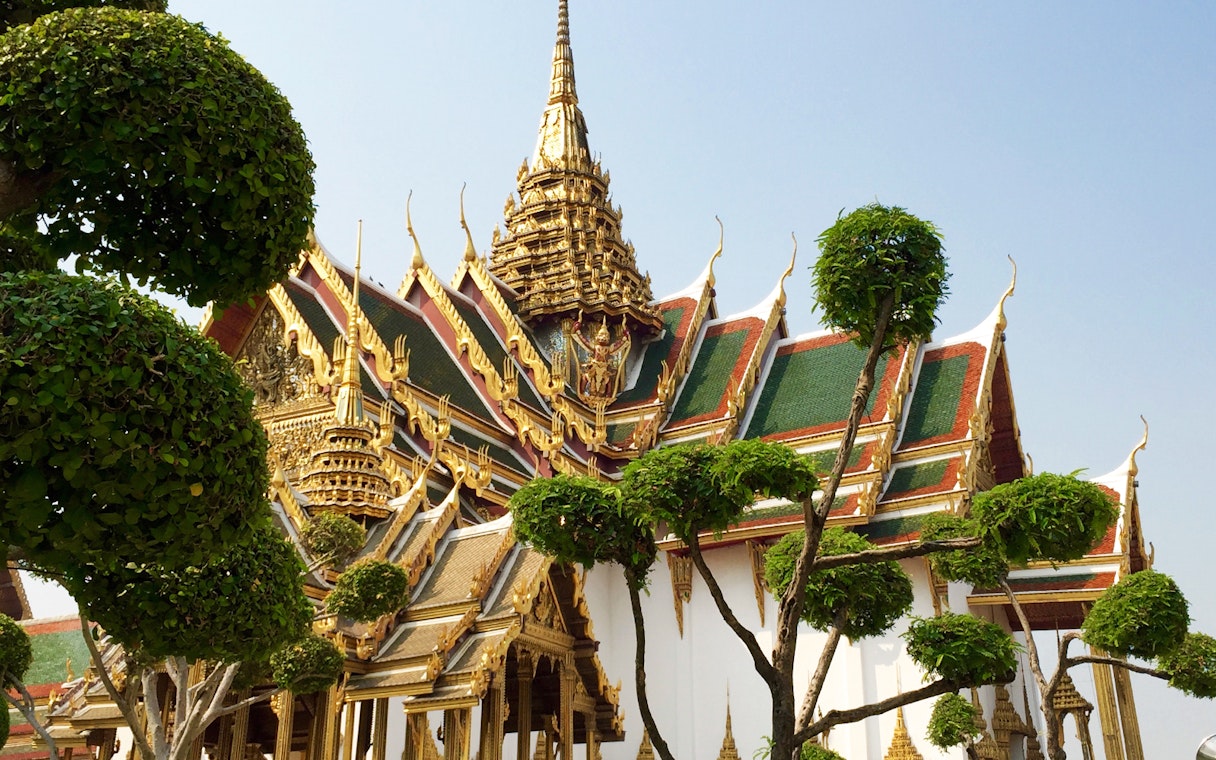 Grand Palace ornate roof and trees, Bangkok, on Wat Phra Kaew walking tour.