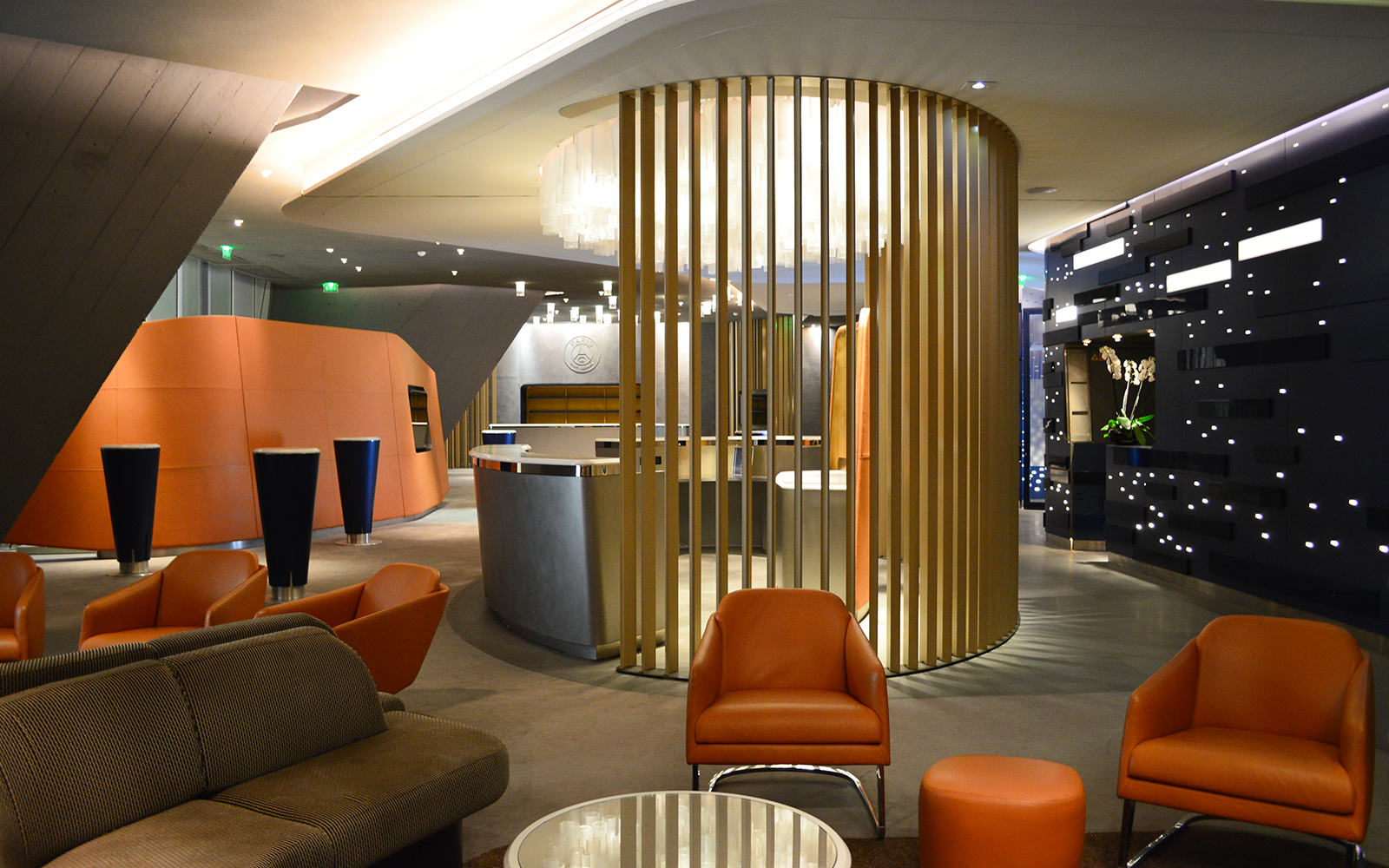 Modern lounge area inside Paris Saint-Germain Parc des Princes Stadium.