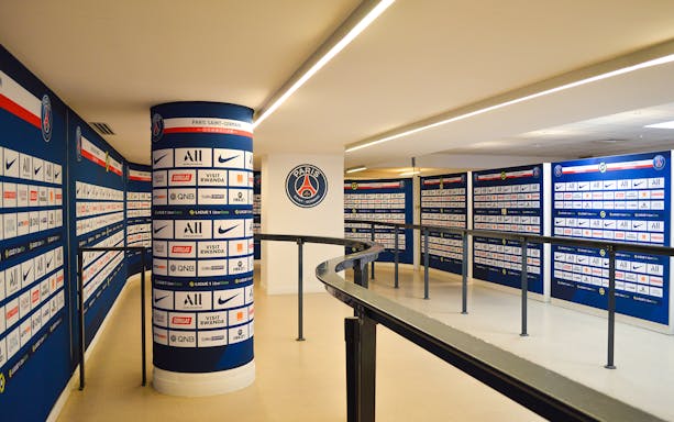 Paris Saint-Germain Parc des Princes press conference area with sponsor logos.