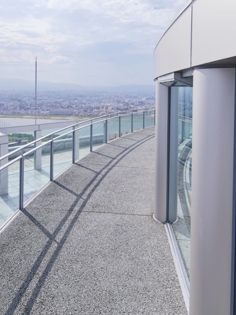 Observation deck view at Umeda Sky Building, Osaka, overlooking cityscape and river.