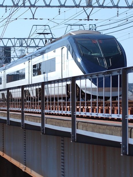Tokyo Skyliner Airport Express train crossing a bridge.