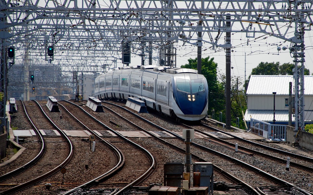 Tokyo Skyliner Airport Express departing station on railway tracks.