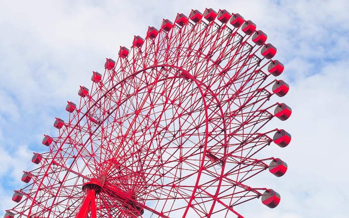 Red Ferris wheel against a blue sky, HEP Ferris Wheel Ticket.