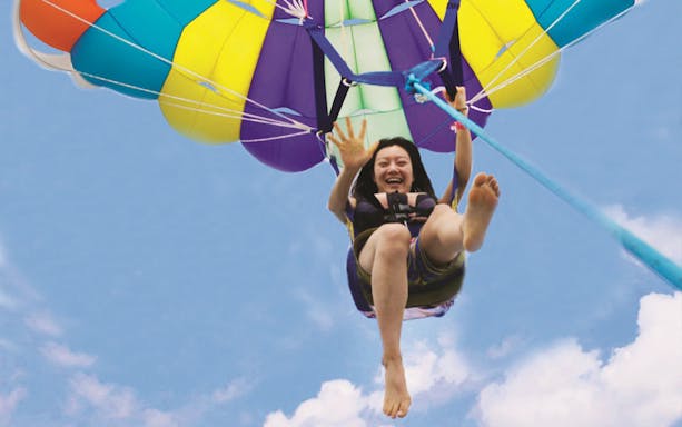 Parasailing adventure on Nusa Lembongan Island cruise.