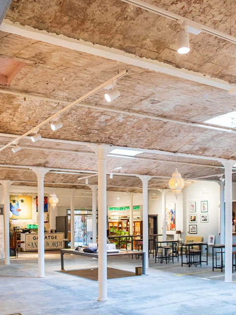 Palau Dalmases interior with seating and art displays for Flamenco Show in Barcelona.