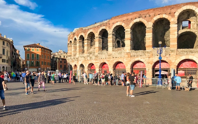 Verona Arena with tourists in Piazza Bra, part of Combo: Gardaland Park + Verona City Card.
