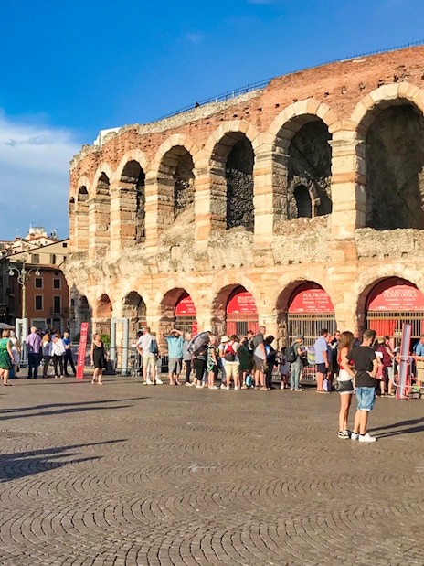 Verona Arena with tourists in Piazza Bra, part of Combo: Gardaland Park + Verona City Card.