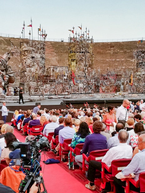 Crowd seated at Verona Arena for a live performance, Italy.