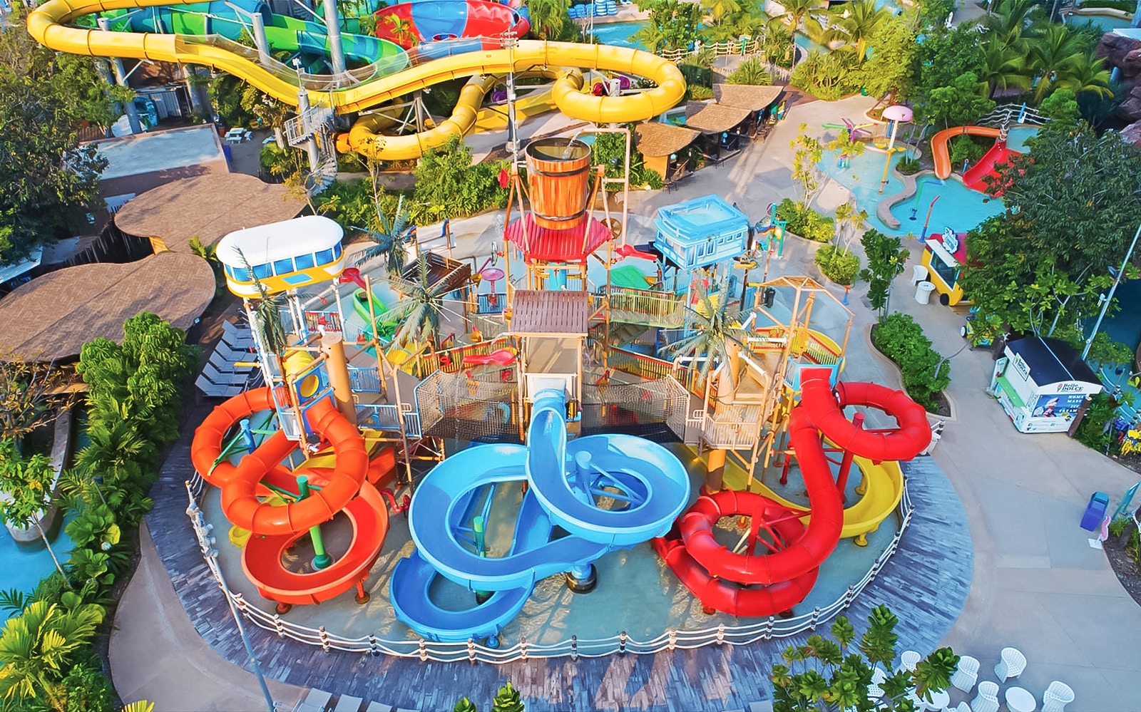 Aerial view of colorful water slides at Vana Nava Water Jungle in Hua Hin, Thailand.