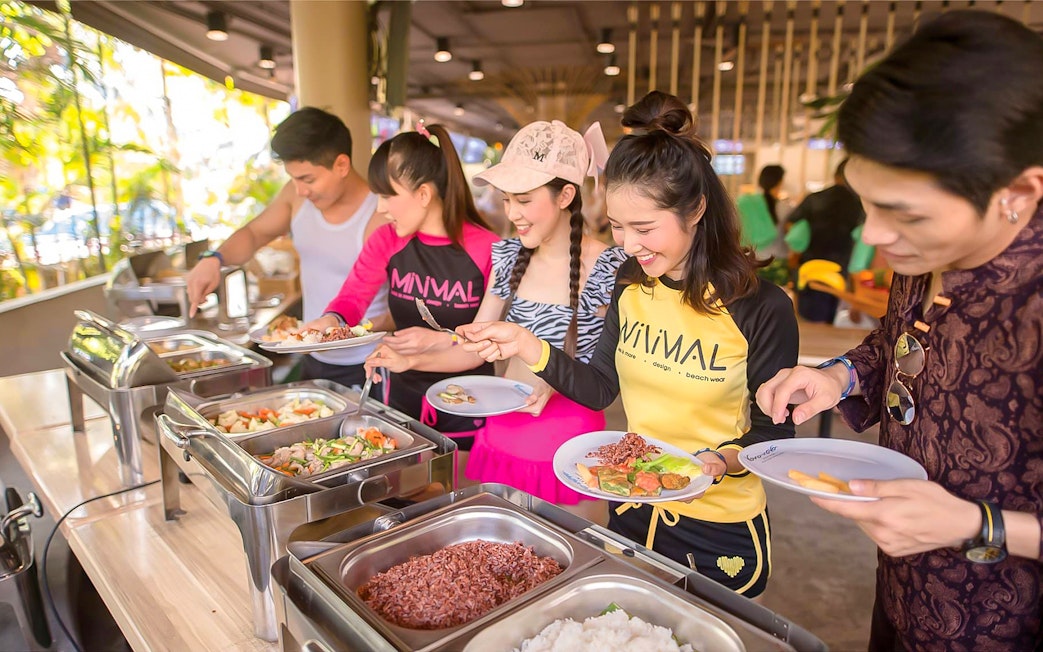 Guests enjoying a buffet at Vana Nava Water Jungle.