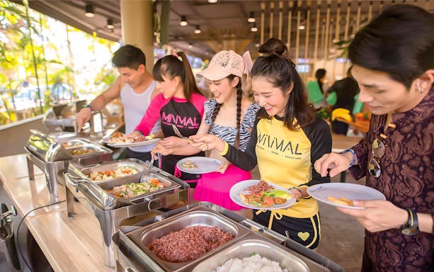 Guests enjoying a buffet at Vana Nava Water Jungle.