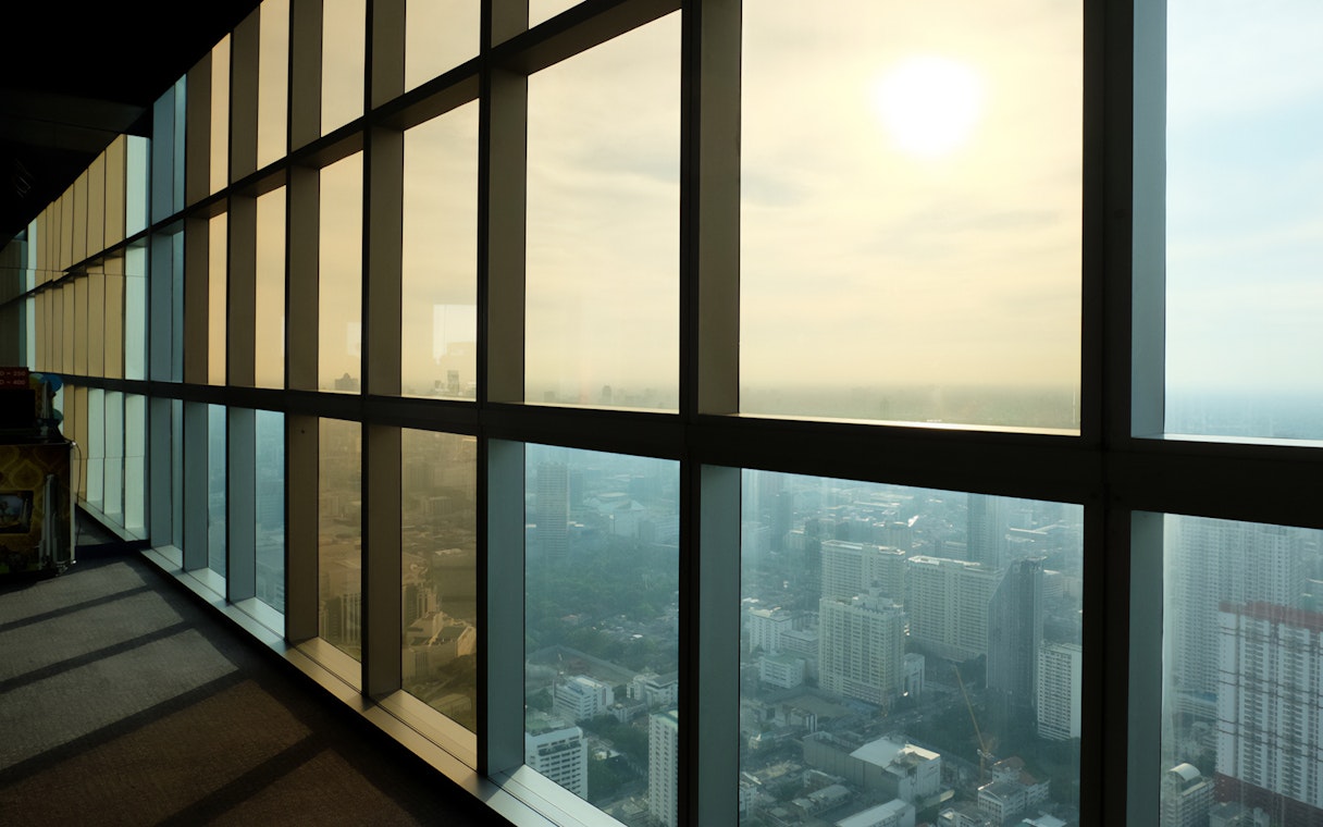 View from Baiyoke Sky Hotel Observation Deck overlooking Bangkok cityscape.