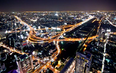 Bangkok cityscape view from Baiyoke Sky Hotel Observation Deck at night.