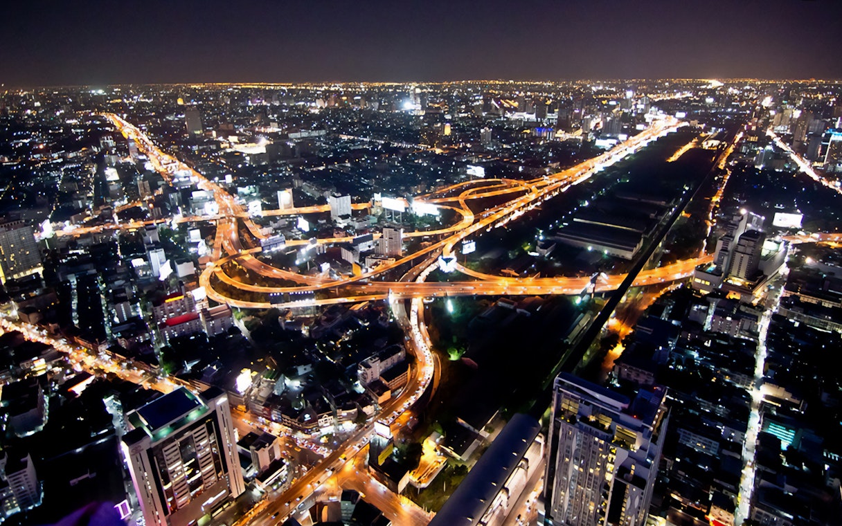 Bangkok cityscape view from Baiyoke Sky Hotel Observation Deck at night.