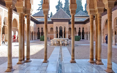 Courtyard of the Lions at Alhambra, Granada, viewed during a guided tour from Malaga.