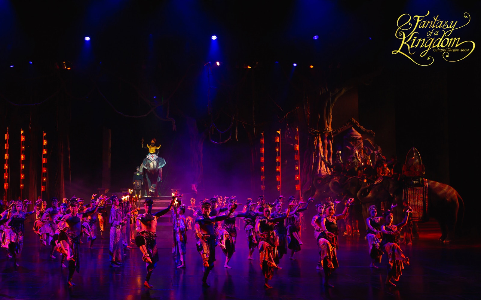 Phuket Fantasea cultural show with elephants and performers in traditional costumes, Thailand.