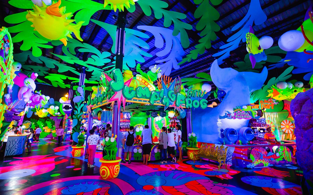 Visitors exploring vibrant attractions at Similan Entertainment Centre, Phuket Fantasea.