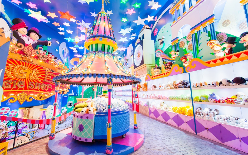 Phuket Fantasea theme park colorful toy shop interior with vibrant decorations.