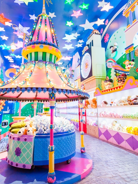 Phuket Fantasea theme park colorful toy shop interior with vibrant decorations.