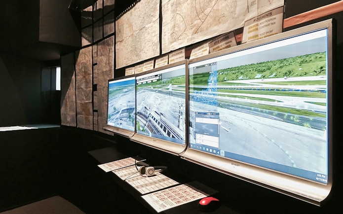 Flight simulator screens displaying airport runway for Aeroviation Full Flight Experience.