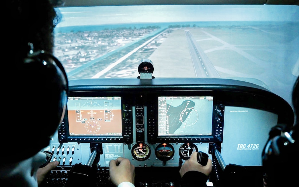 Flight simulator cockpit view during Aeroviation Full Flight Experience.