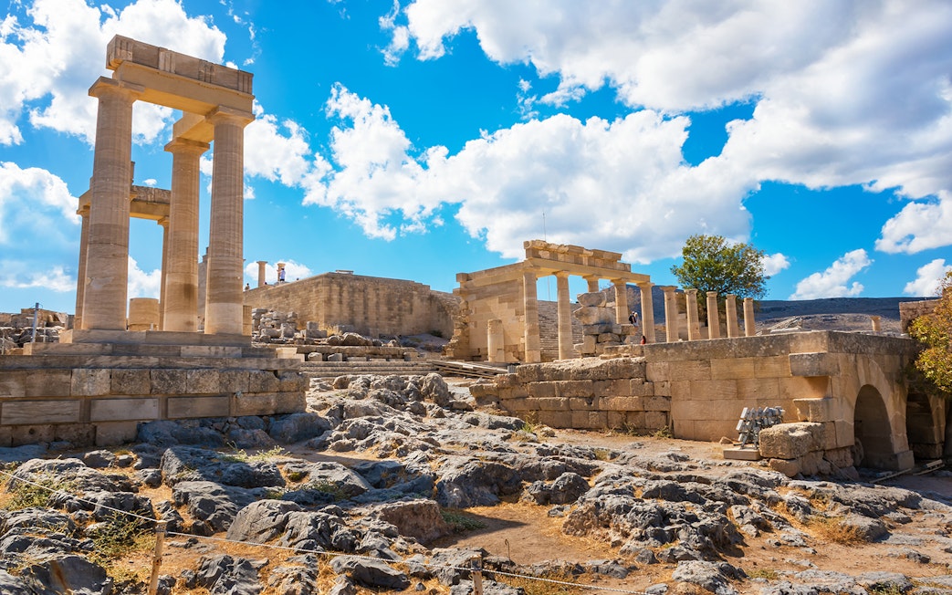 Acropolis of Lindos ruins under a blue sky, Rhodes, Greece.